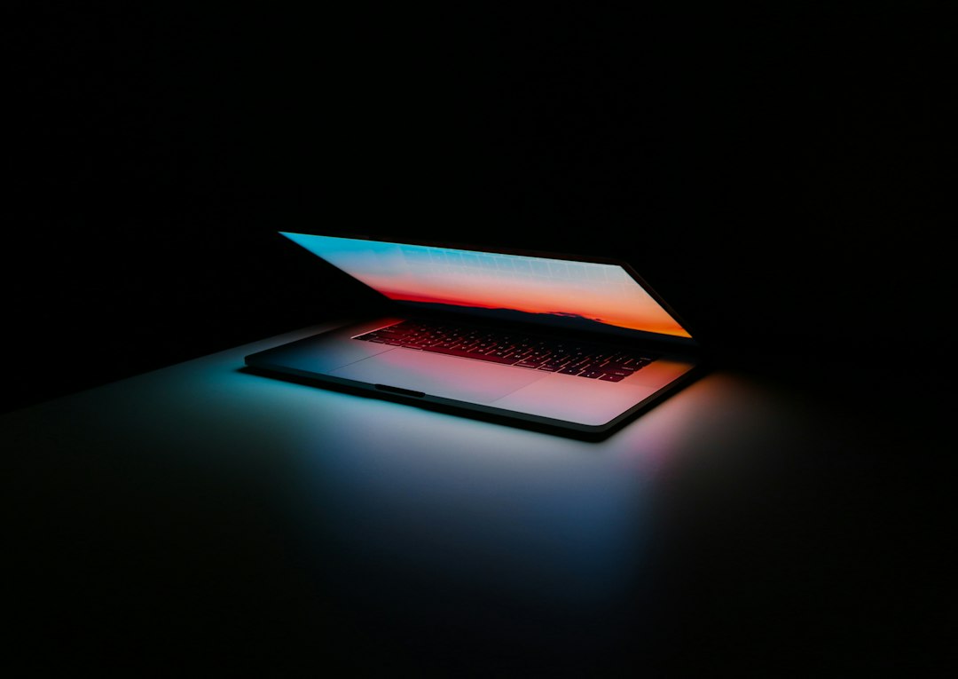 Gray and black laptop computer on surface